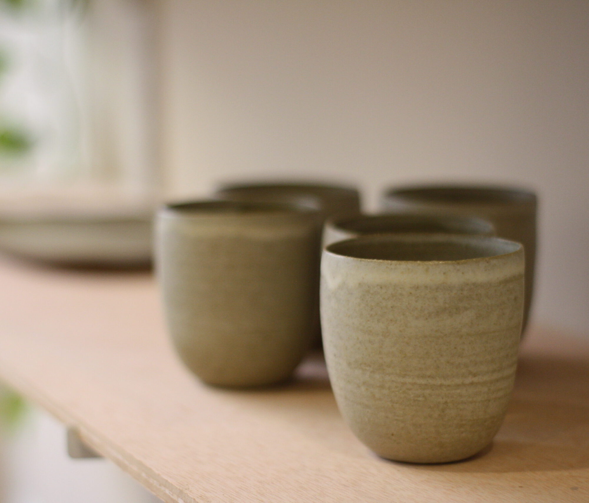 Buño pottery cups in speckled cream glaze by Al Ceramica