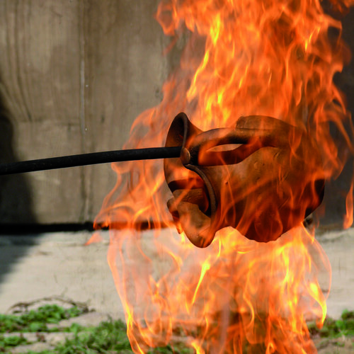 Traditional charring method of Gundivos Galician ceramic. 