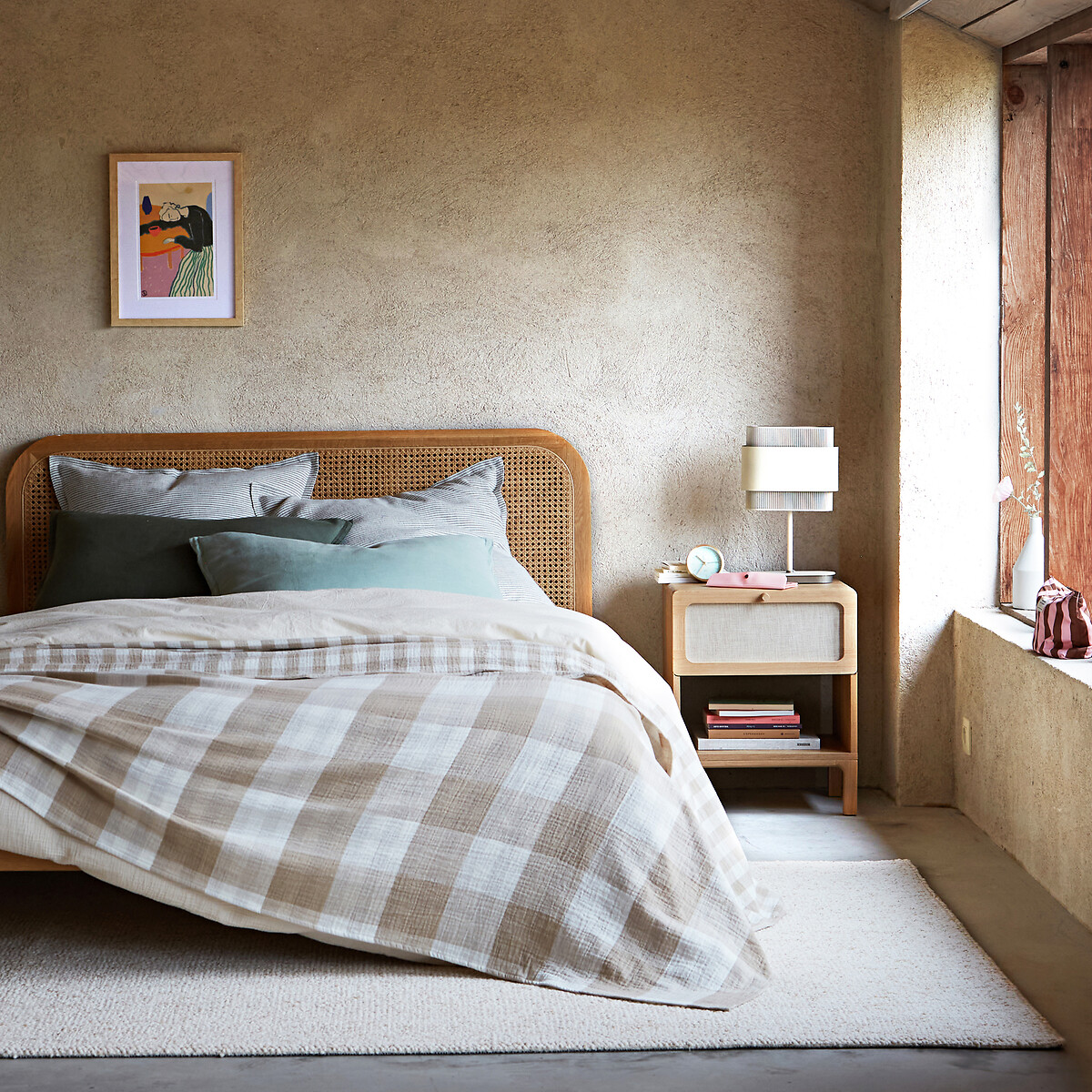 large rug under bed for visual balance