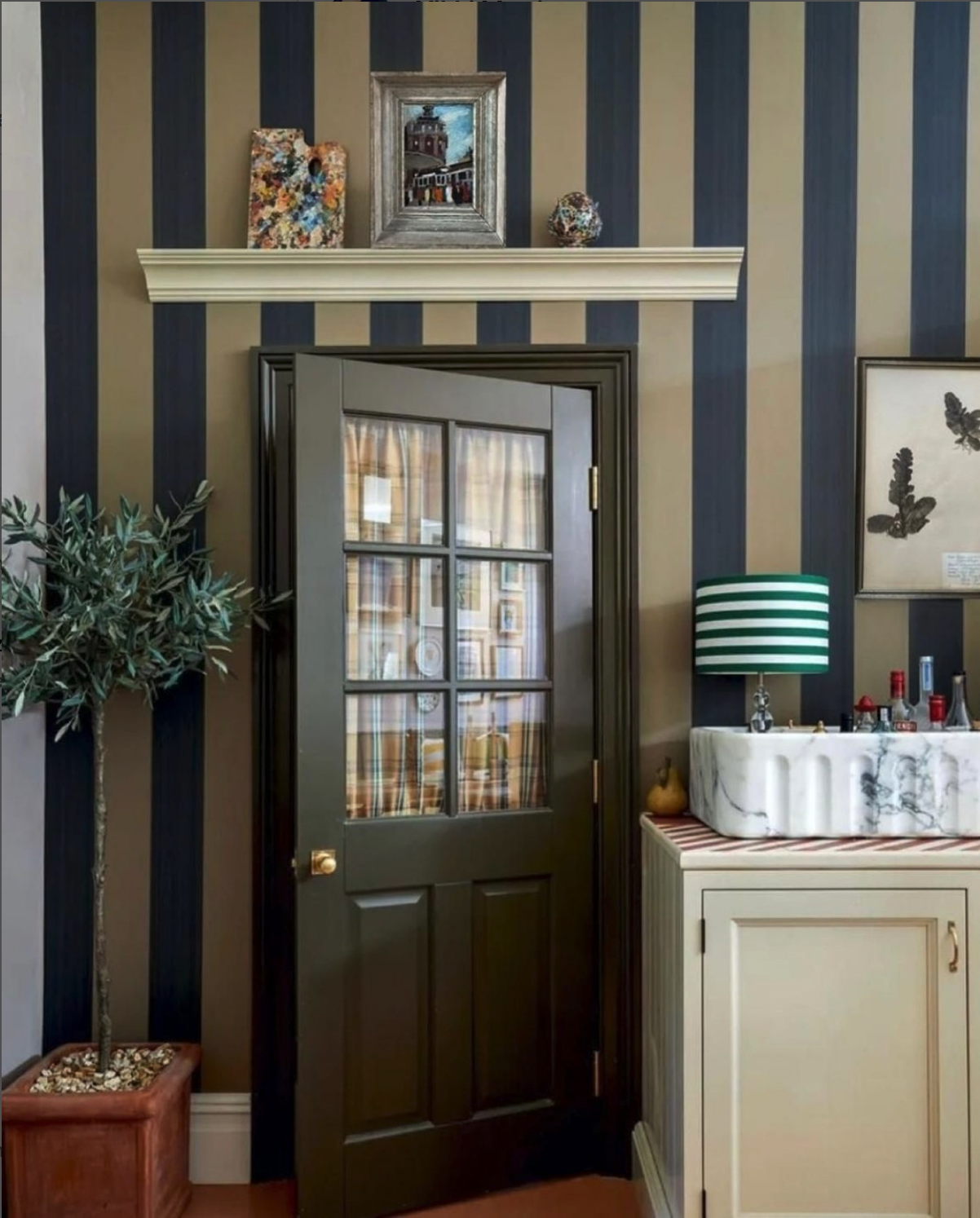 Decorative ledge converted into over-door shelf.