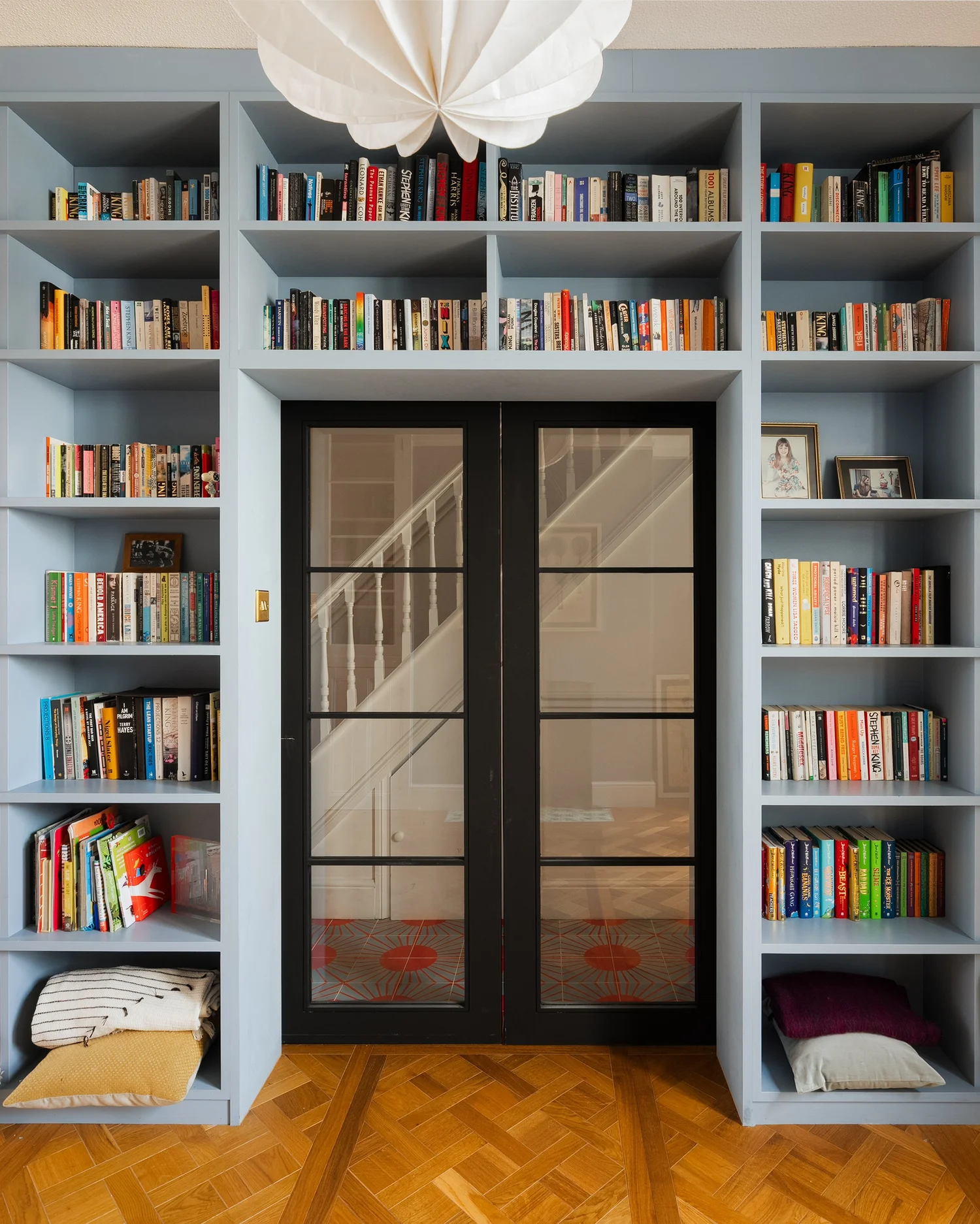 Matching your over-door shelf to the surrounding woodwork creates a beautifully seamless, cohesive look.