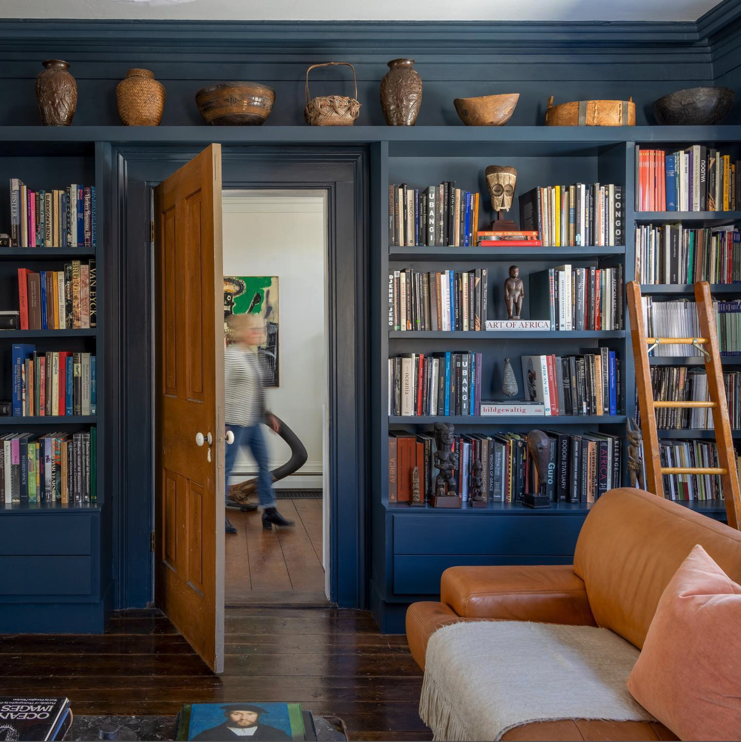 Blue over-door shelves with rustic decor