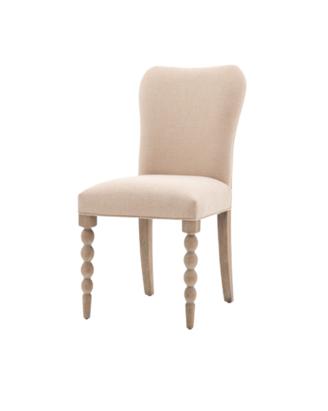 Upholstered cream parsons dining chair style.