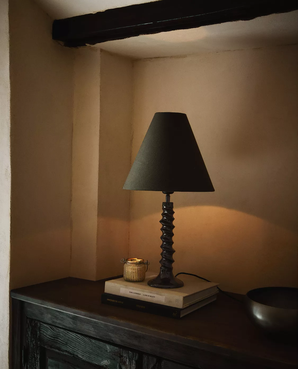 Dark brown table lamp with lacquered base an black cotton shade.