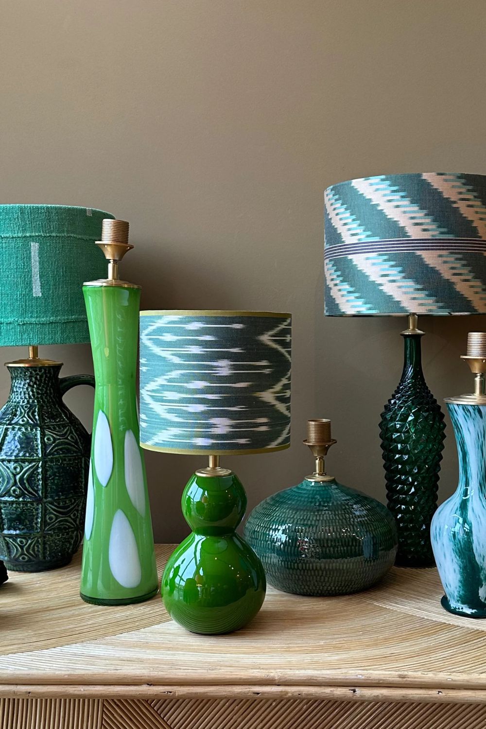 A collection of green table lamps by Madame Garage