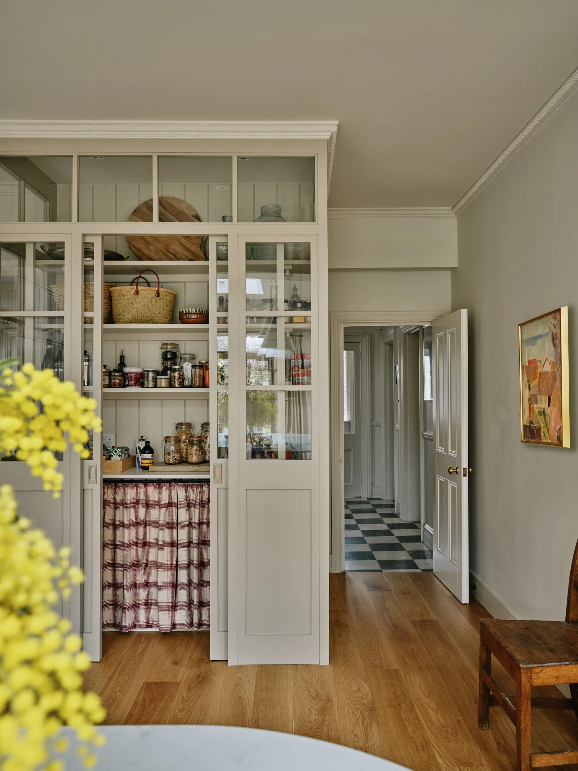 Glass pantry in mineral tones by Emma Ainscough