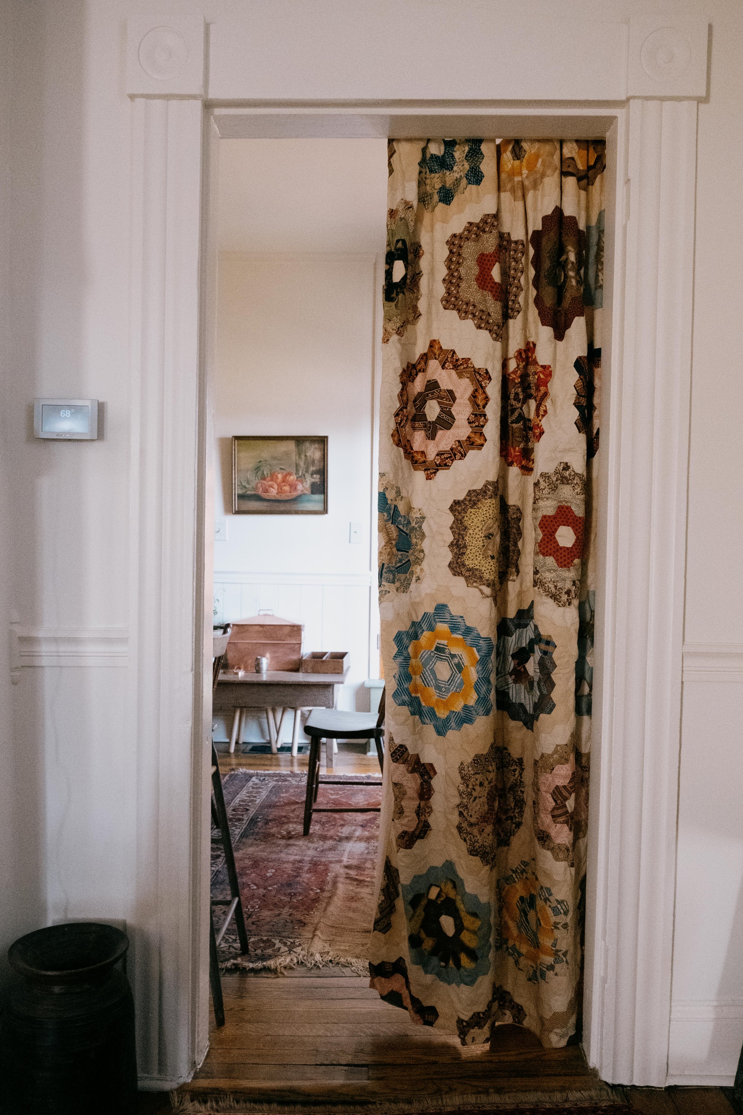 Patchwork quilt used as curtain door