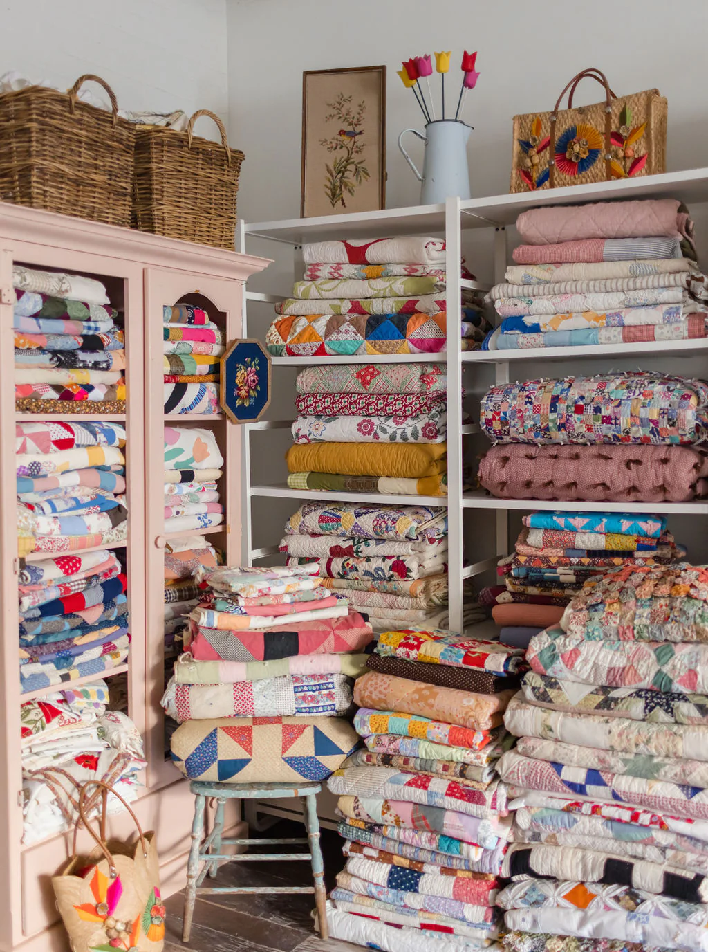 Vintage patchwork quilts in Honeybea workshop.