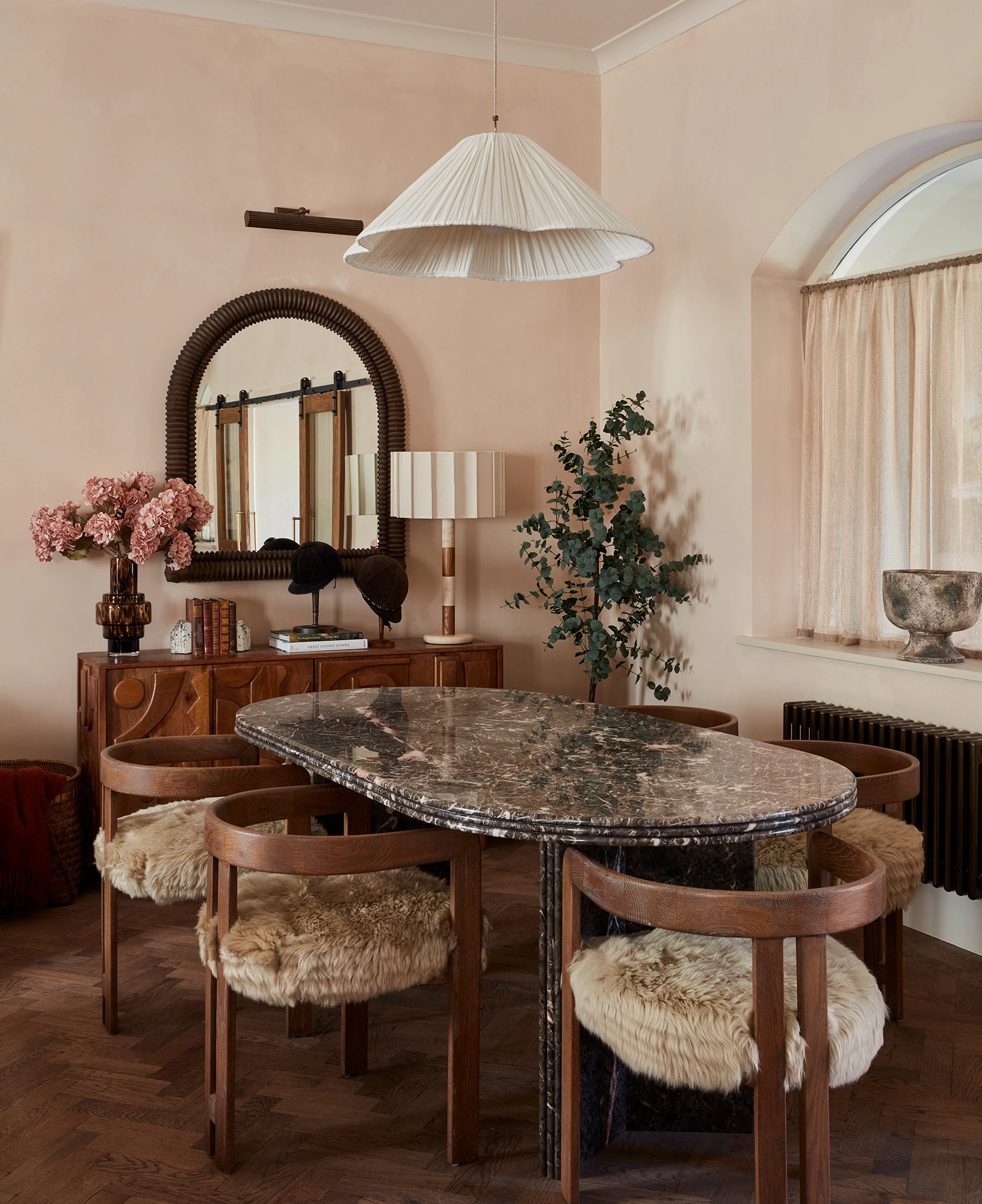Curved stone dining table by Run For The Hills